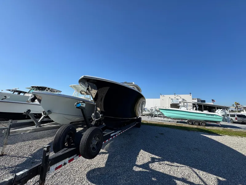 Slide: The Image of 2019 Blackwater 43SF boat on trailer under clear blue sky. - 11