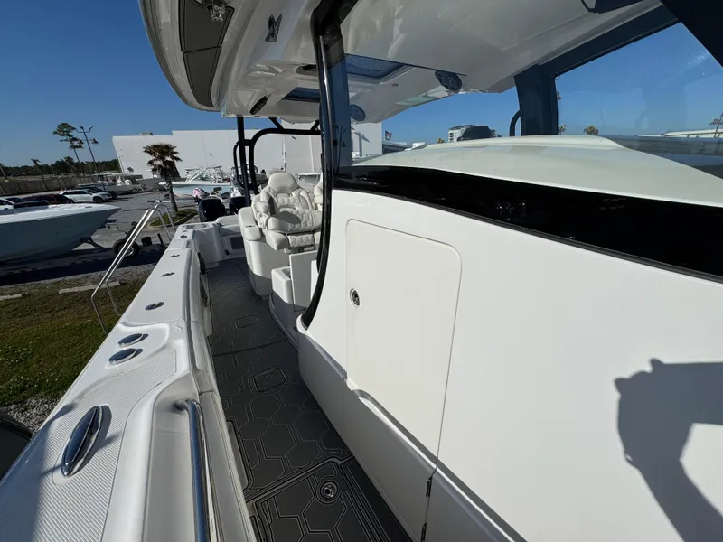 Slide: The Image of 2019 Blackwater 43SF boat deck with seating and modern design. - 22