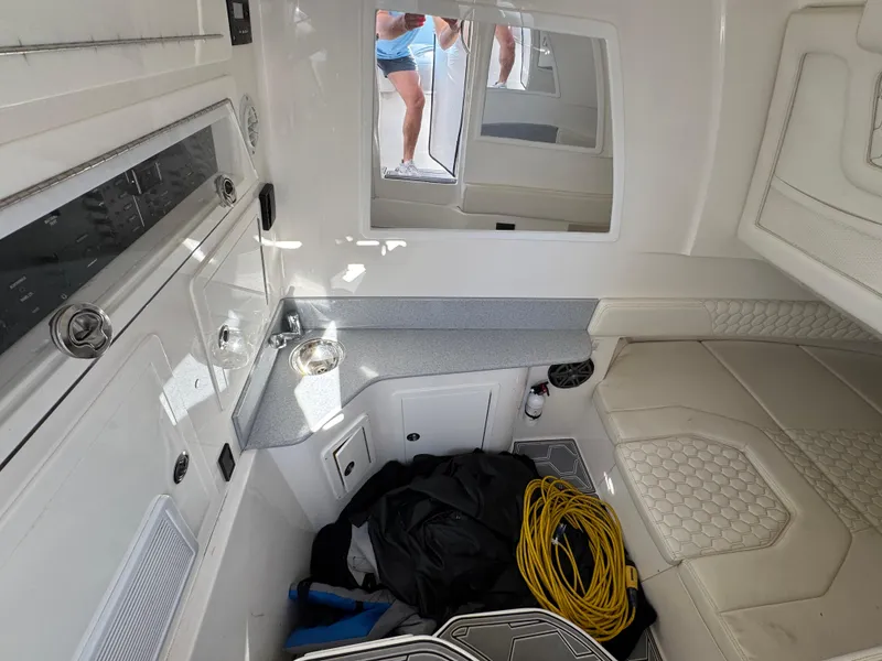 Slide: The Image of Interior of 2019 Blackwater 43SF boat with seating and storage area. - 24