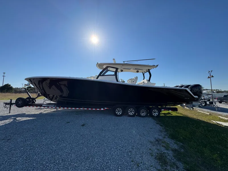 Slide: The Image of 2019 Blackwater 43SF boat on trailer under clear blue sky. - 3