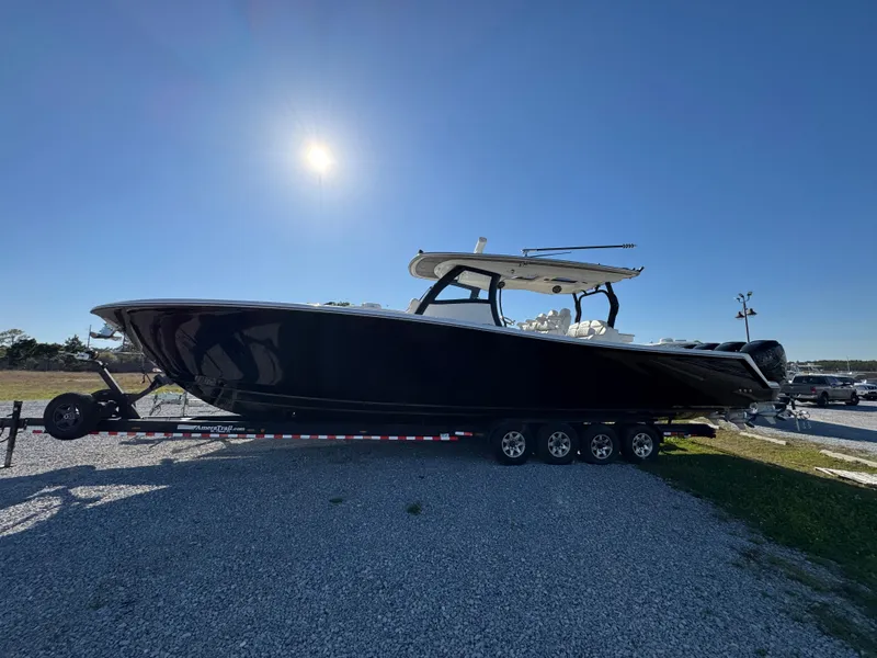 Slide: The Image of Blackwater 43SF 2019 boat on trailer under clear blue sky. - 4