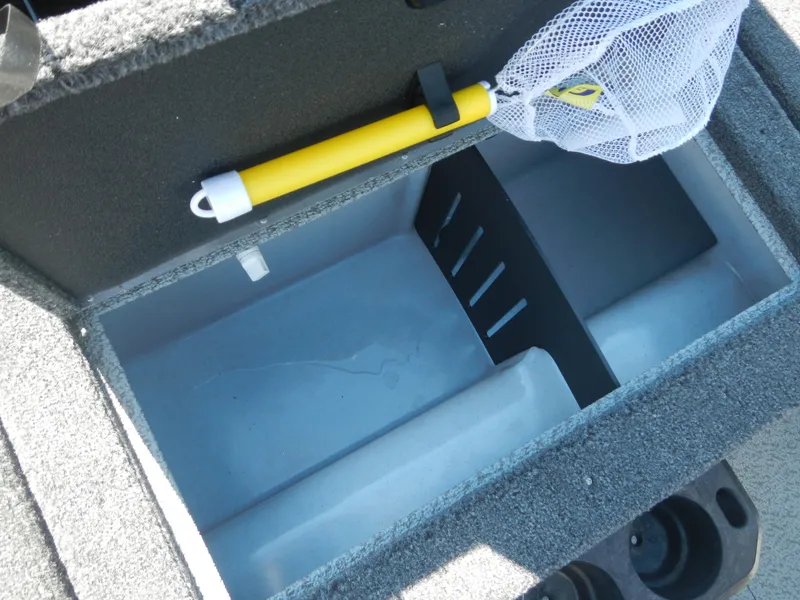 Slide: The Image of Storage compartment of 2024 Lund 1875 Impact XS Sport boat with fishing net. - 10