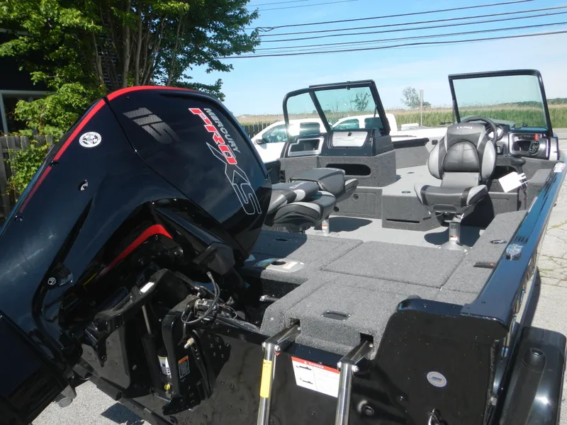 Slide: The Image of 2024 Lund 1875 Impact XS Sport boat with Yamaha outboard motor. - 4