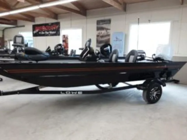 Slide: The Image of 2023 Lowe RX1860 boat on display in showroom. - 4