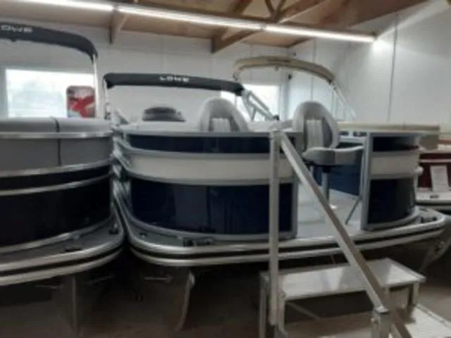 Slide: The Image of 2023 Lowe SF194 pontoon boat in showroom, front view. - 3