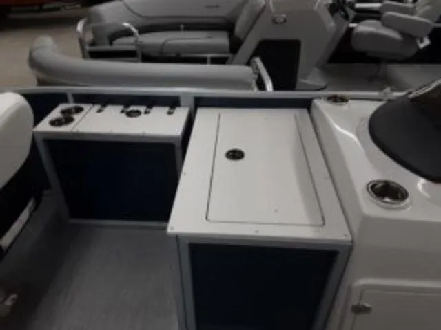 Slide: The Image of 2023 Lowe SF194 boat interior with seating and storage compartments. - 4