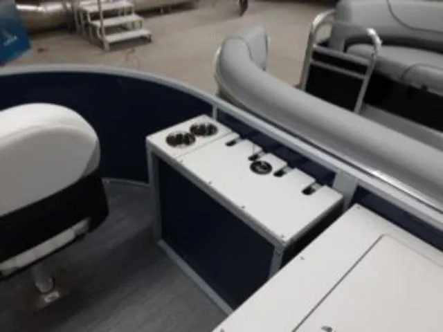 Slide: The Image of Interior of 2023 Lowe SF194 boat with seating and storage compartments. - 5