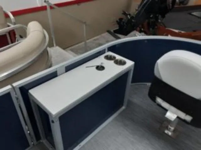 Slide: The Image of Interior of 2023 Lowe SF194 boat with seating and cup holders. - 6