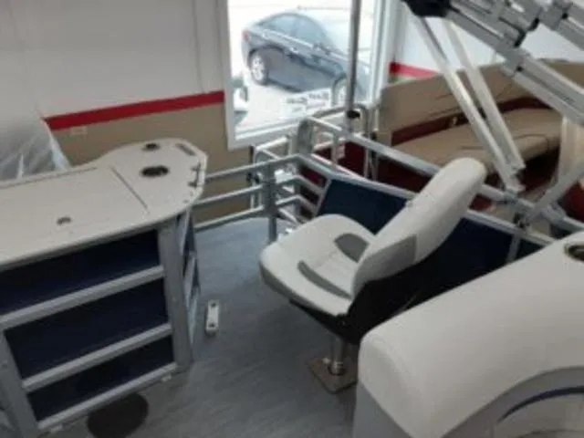 Slide: The Image of Interior of 2023 Lowe SF194 boat with seating and storage compartments. - 9
