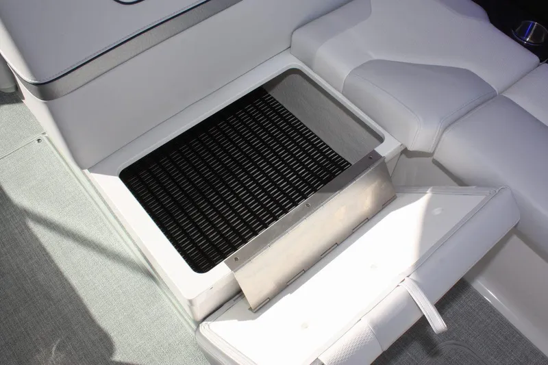 Slide: The Image of Open storage compartment on a 2025 Formula 350 Sun Sport boat. - 25
