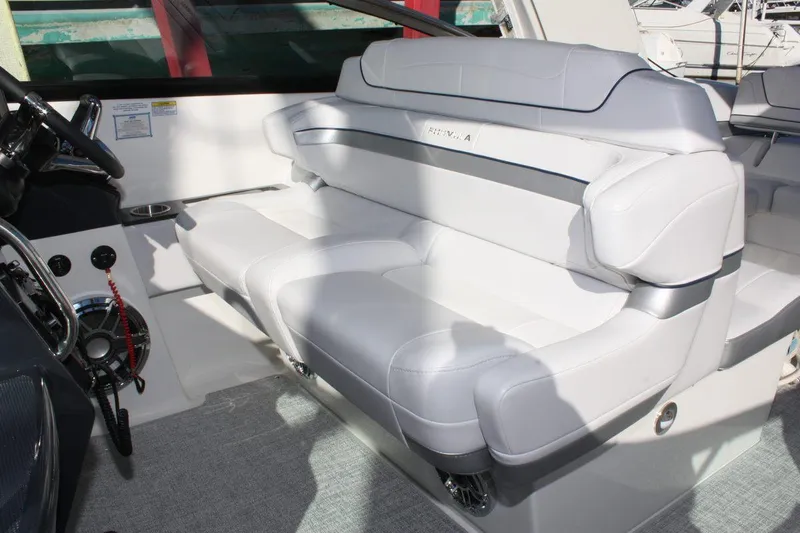 Slide: The Image of 2025 Formula 350 Sun Sport boat interior with luxurious white seating. - 26