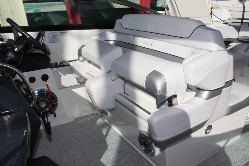 Slide: The Image of Interior seating of 2025 Formula 350 Sun Sport boat with luxurious white upholstery. - 27