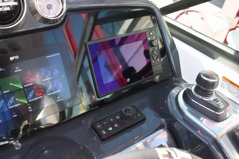 Slide: The Image of 2025 Formula 350 Sun Sport dashboard with advanced navigation and control systems. - 30