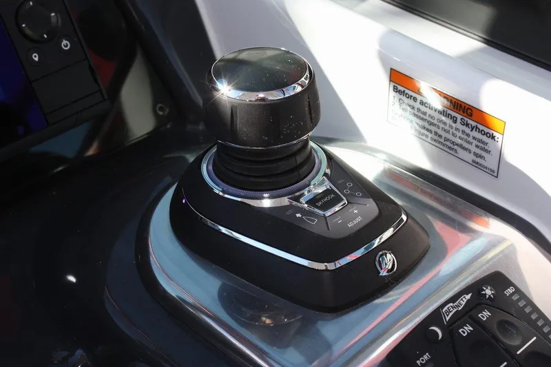 Slide: The Image of Joystick control on the 2025 Formula 350 Sun Sport boat. - 31