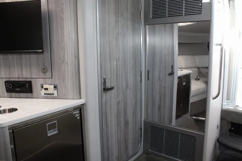 Slide: The Image of Interior of 2025 Formula 350 Sun Sport boat with modern amenities and sleek design. - 44