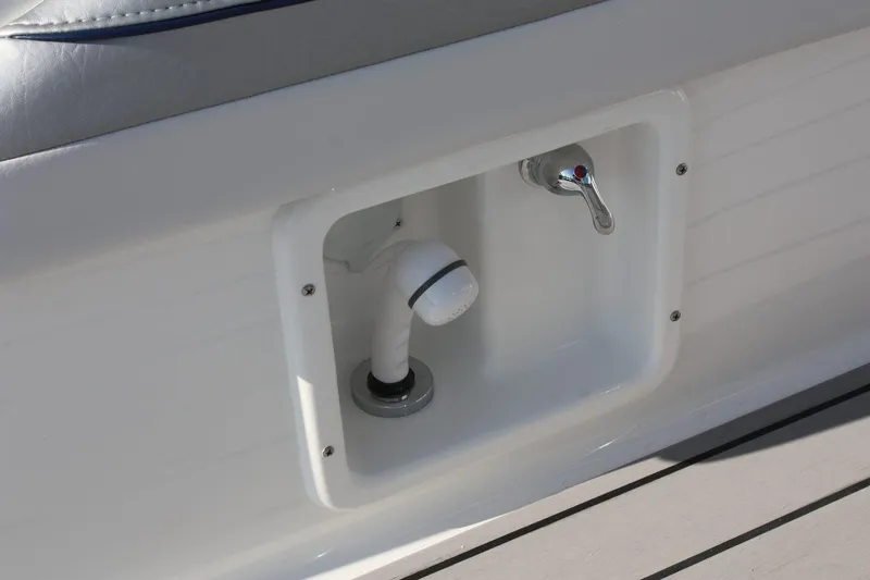 Slide: The Image of Built-in shower and faucet on the 2025 Formula 350 Sun Sport boat. - 5