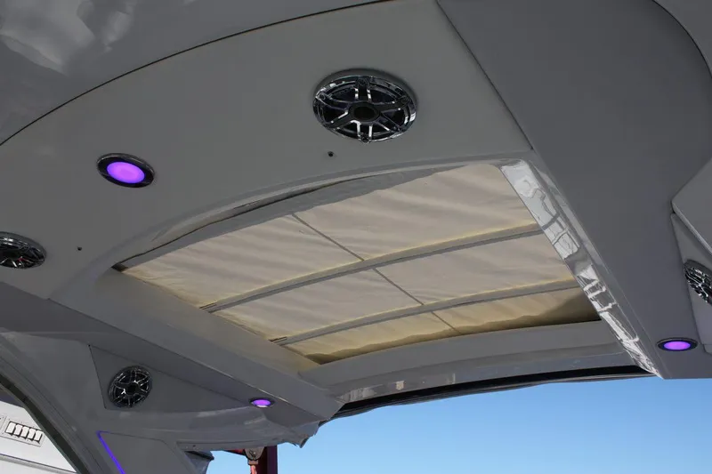 Slide: The Image of 2025 Formula 350 Sun Sport retractable roof with integrated speakers and LED lighting. - 9
