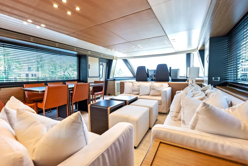 Slide: The Image of Luxurious interior of 2016 Azimut Magellano 76 yacht with plush seating and dining area. - 20