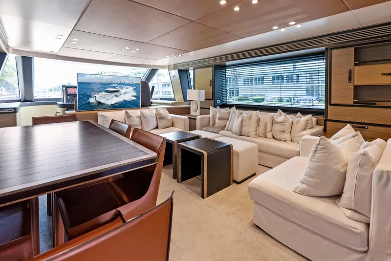 Slide: The Image of Luxurious interior of 2016 Azimut Magellano 76 yacht with elegant seating and dining area. - 21