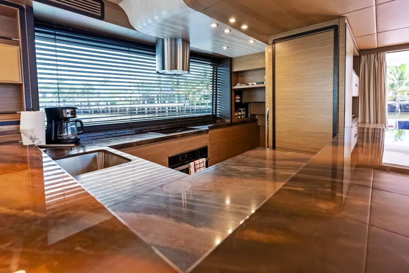Slide: The Image of Luxurious kitchen interior of 2016 Azimut Magellano 76 yacht with modern amenities. - 22