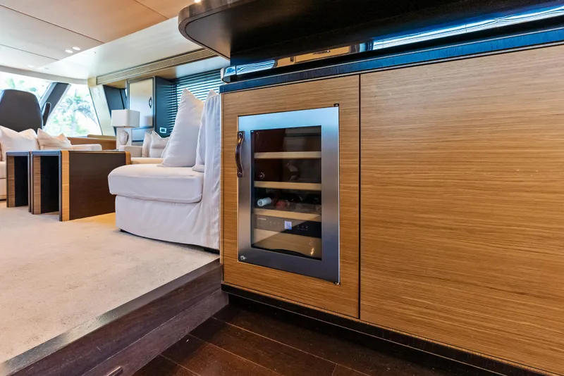 Slide: The Image of Luxurious interior of 2016 Azimut Magellano 76 yacht with modern cabinetry and seating. - 23