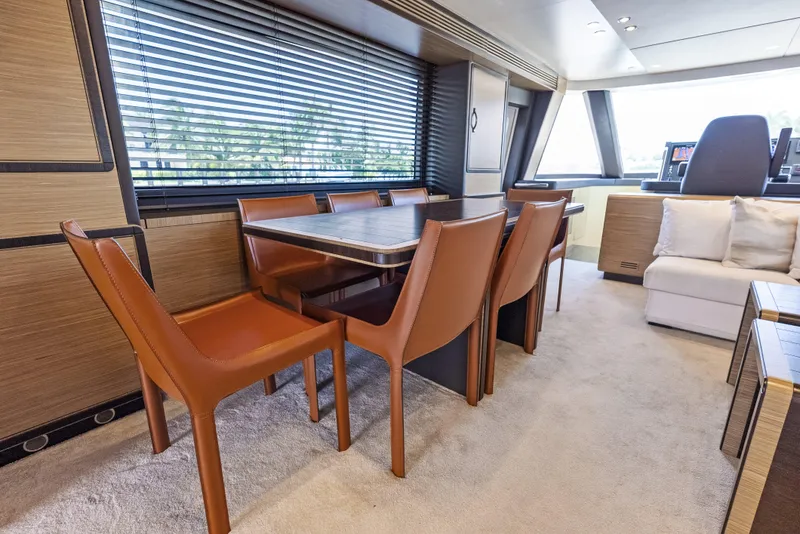 Slide: The Image of Luxurious interior of 2016 Azimut Magellano 76 yacht with elegant dining area. - 24