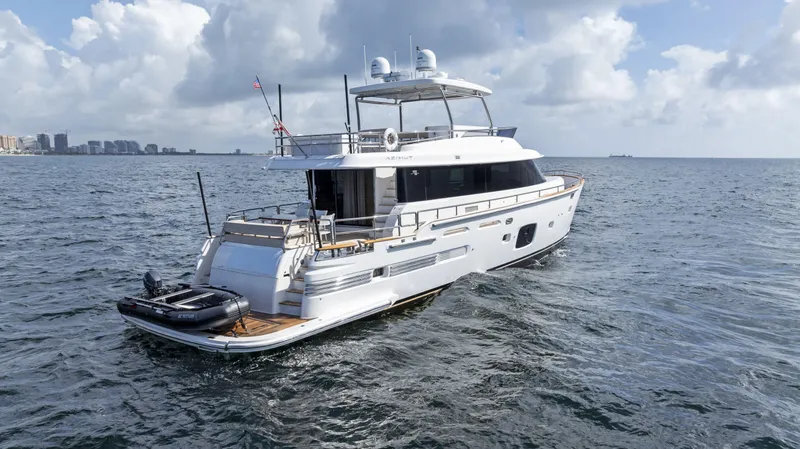 Slide: The Image of Azimut Magellano 76 yacht, 2016 model, cruising on open sea under cloudy sky. - 4