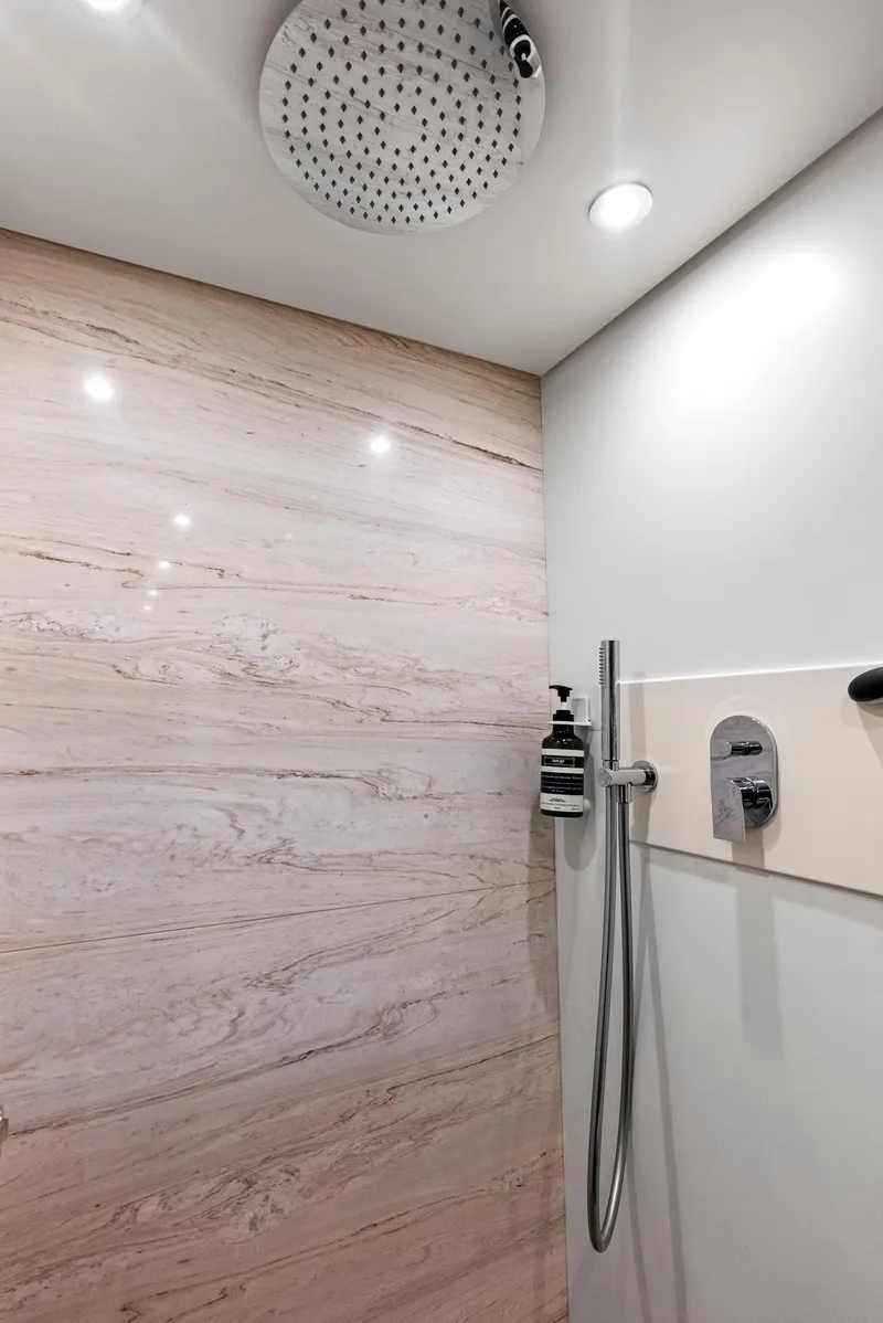 Slide: The Image of Luxury shower in 2016 Azimut Magellano 76 yacht with modern fixtures and elegant design. - 43