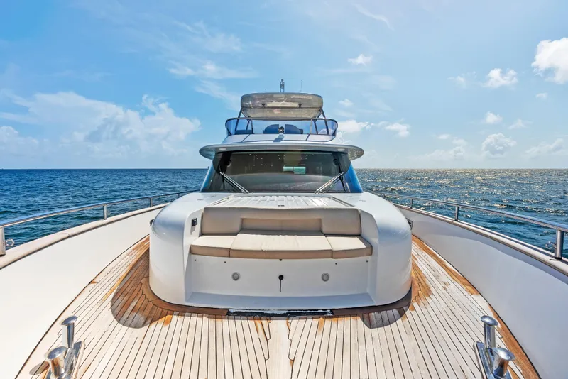 Slide: The Image of Azimut Magellano 76 yacht, 2016 model, cruising on open sea under clear blue sky. - 46