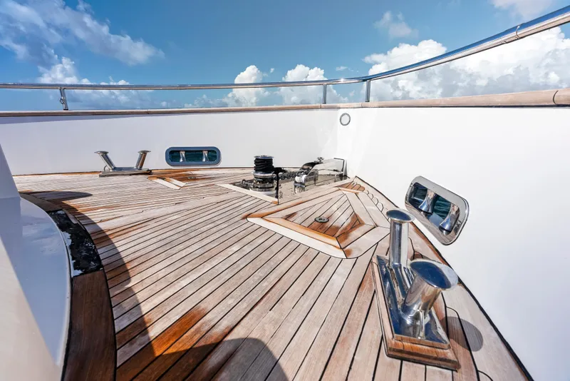 Slide: The Image of Azimut Magellano 76 yacht deck, 2016 model, featuring sleek wooden design and ocean view. - 47