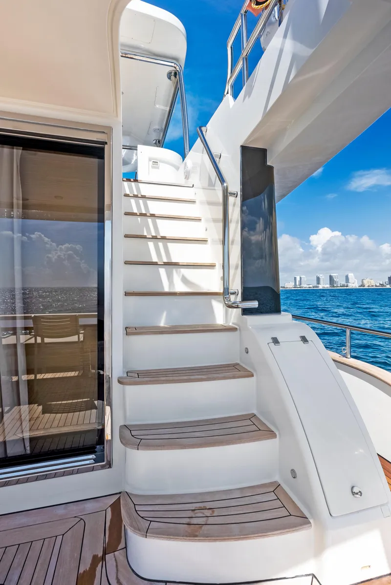Slide: The Image of Staircase on 2016 Azimut Magellano 76 yacht with ocean view. - 48