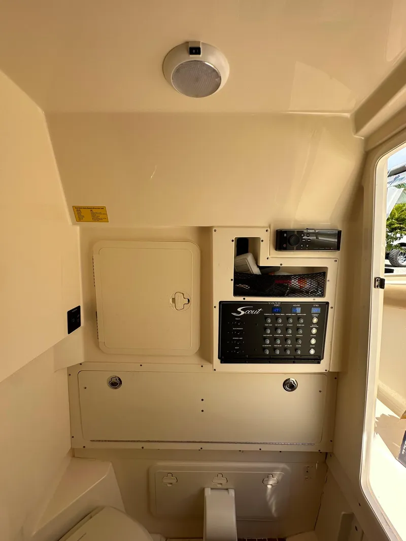Slide: The Image of Interior control panel of a 2018 Scout 300 LXF boat. - 19