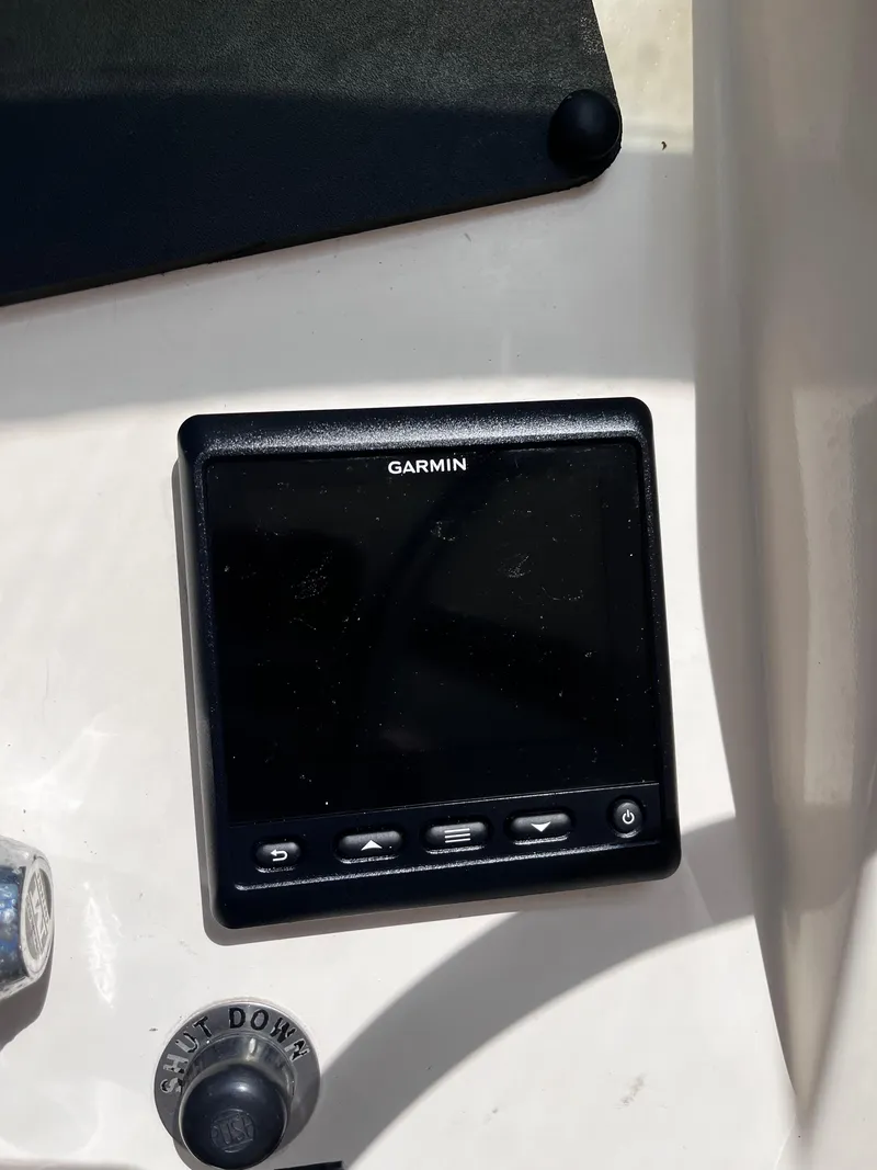 Slide: The Image of Garmin display on 1991 Hatteras 52 Cockpit Motoryacht dashboard. - 15