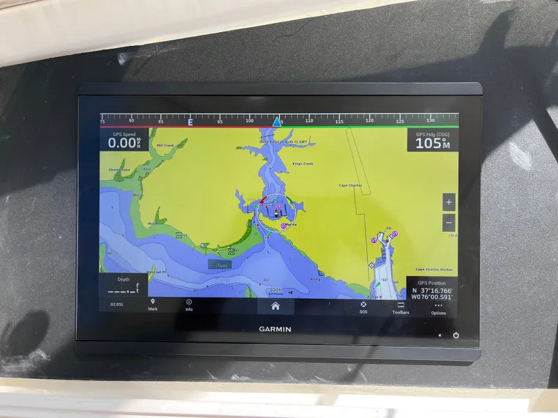 Slide: The Image of Garmin navigation display on 1991 Hatteras 52 Cockpit Motoryacht, showing nautical chart and GPS data. - 16