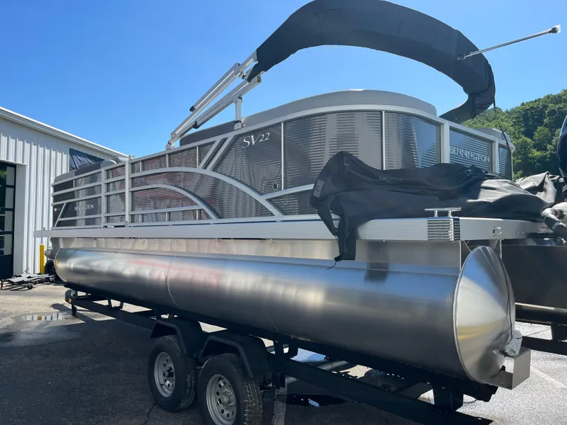 Slide: The Image of 2024 Bennington 22 SVSR pontoon boat on a trailer. - 5