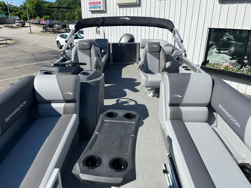 Slide: The Image of 2024 Bennington 22 SVSR pontoon boat with spacious seating and modern design. - 8