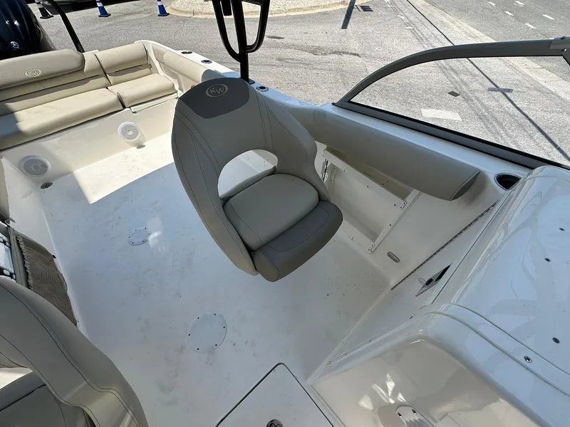 Slide: The Image of 2024 Key West 239 DFS boat interior with seating and console. - 9