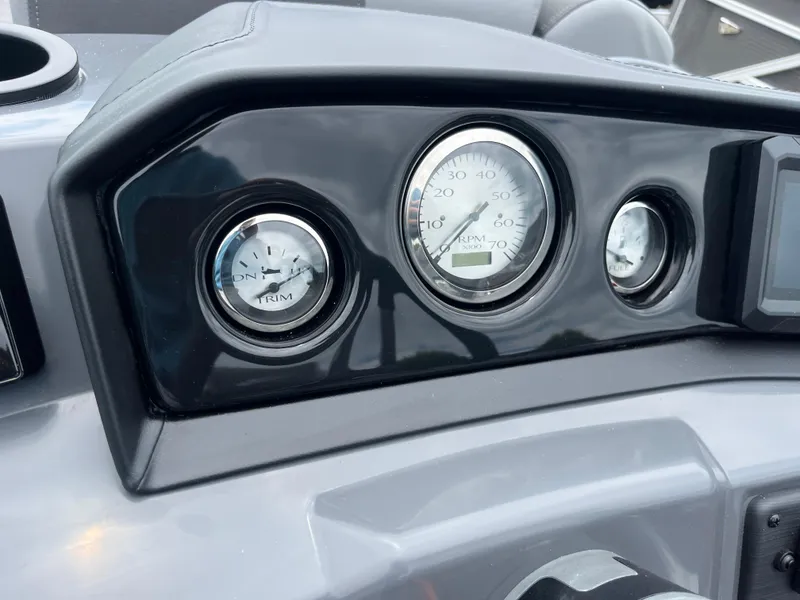 Slide: The Image of Dashboard of 2024 Bennington 22 SVSR boat with gauges and controls. - 13
