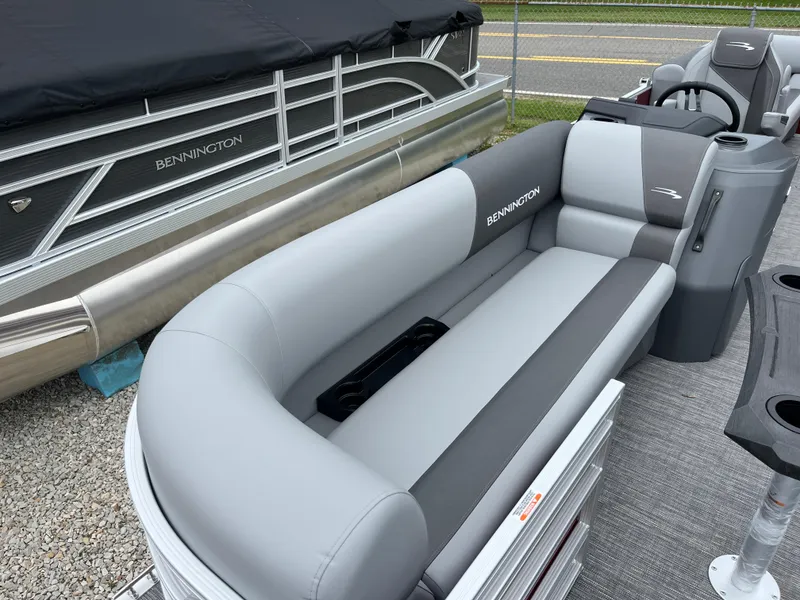 Slide: The Image of 2024 Bennington 22 SVSR pontoon boat with gray seating and modern design. - 4