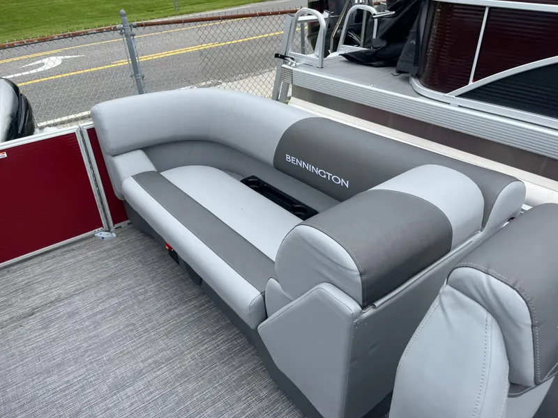 Slide: The Image of 2024 Bennington 22 SVSR pontoon boat with gray and white seating. - 8