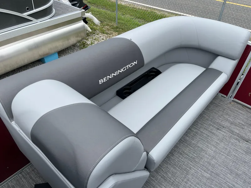 Slide: The Image of 2024 Bennington 22 SVSR pontoon boat with gray and white seating. - 9