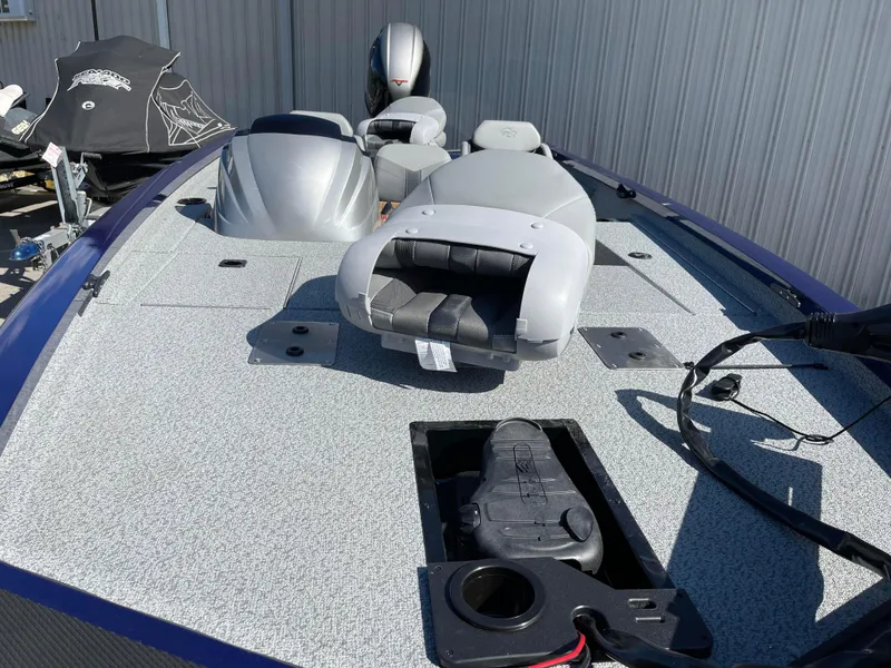 Slide: The Image of 2024 G3 Sportsman 1710 PFX boat deck with seating and storage compartments. - 4