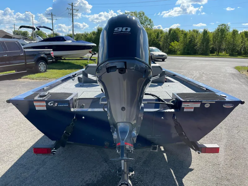 Slide: The Image of 2024 G3 Sportsman 1710 PFX boat with 90 HP outboard motor, rear view. - 6
