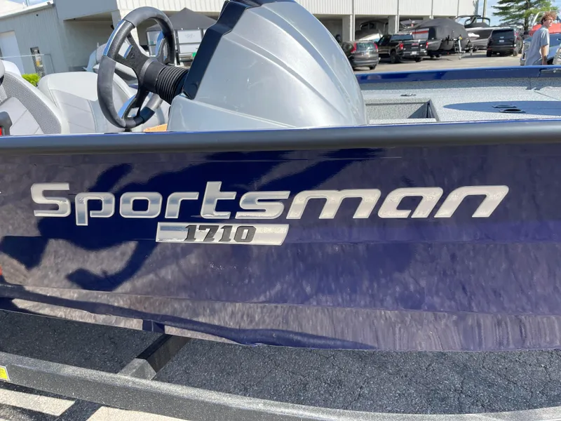 Slide: The Image of 2024 G3 Sportsman 1710 PFX boat side view with logo. - 8
