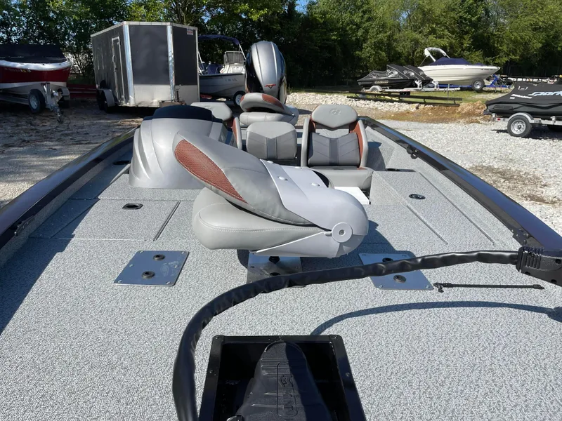Slide: The Image of 2024 G3 Sportsman 1710 PFX fishing boat with seating and storage compartments. - 14