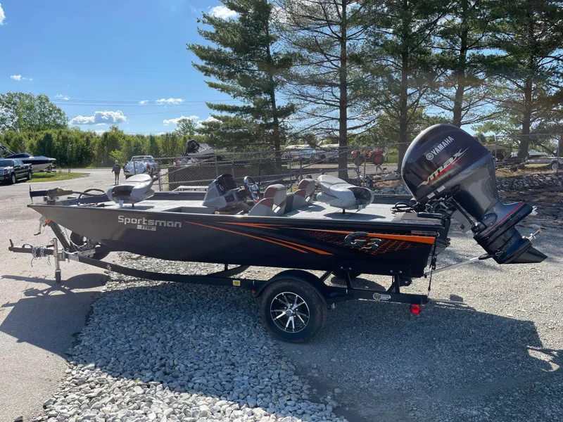 Slide: The Image of 2024 G3 Sportsman 1710 PFX fishing boat with Yamaha outboard motor. - 2
