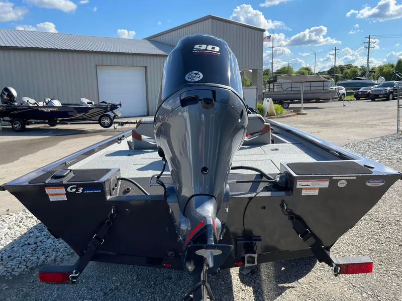 Slide: The Image of 2024 G3 Sportsman 1710 PFX boat with 90 HP engine, rear view. - 7