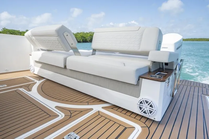 Slide: The Image of Luxury seating on the 2023 Tiara Yachts 48 LS, featuring elegant design and premium materials. - 15