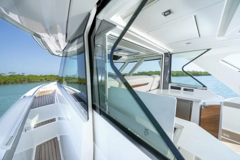 Slide: The Image of 2023 Tiara Yachts 48 LS luxury yacht interior and exterior view. - 22