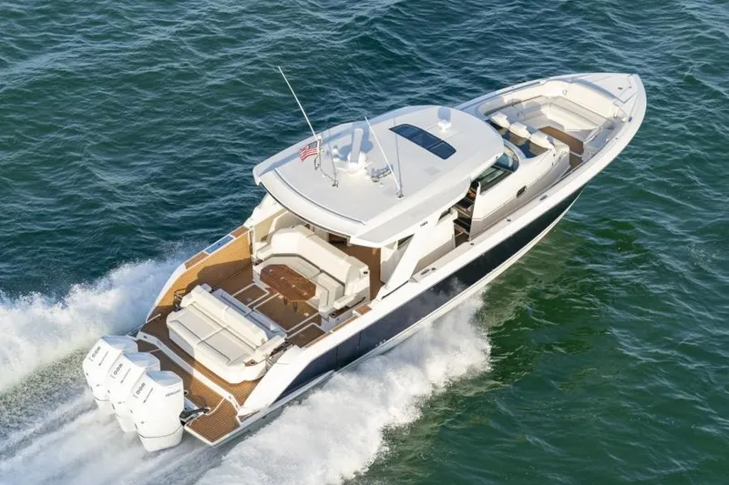 Slide: The Image of 2023 Tiara Yachts 48 LS cruising on the water. - 3